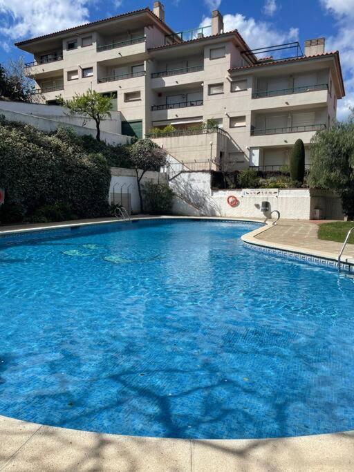 Apartamento Con Piscina En Льянсса Экстерьер фото